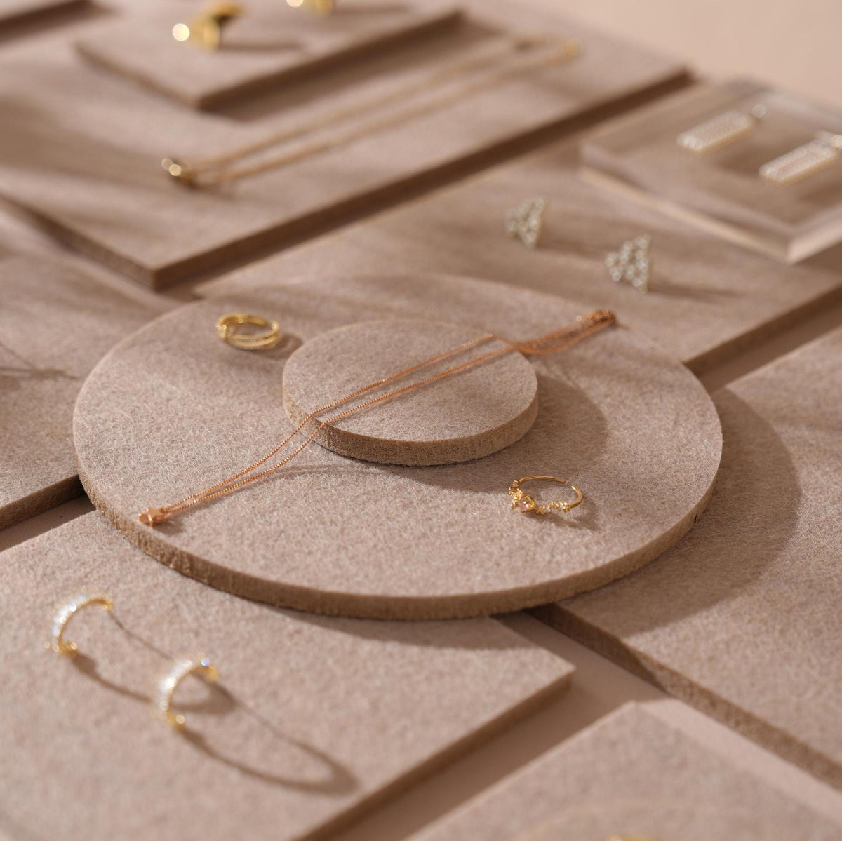 Beige felt modular jewelry display pads