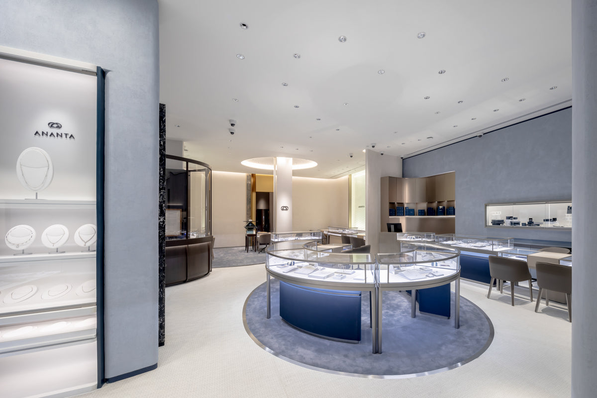 ANANTA curved glass jewelry display island