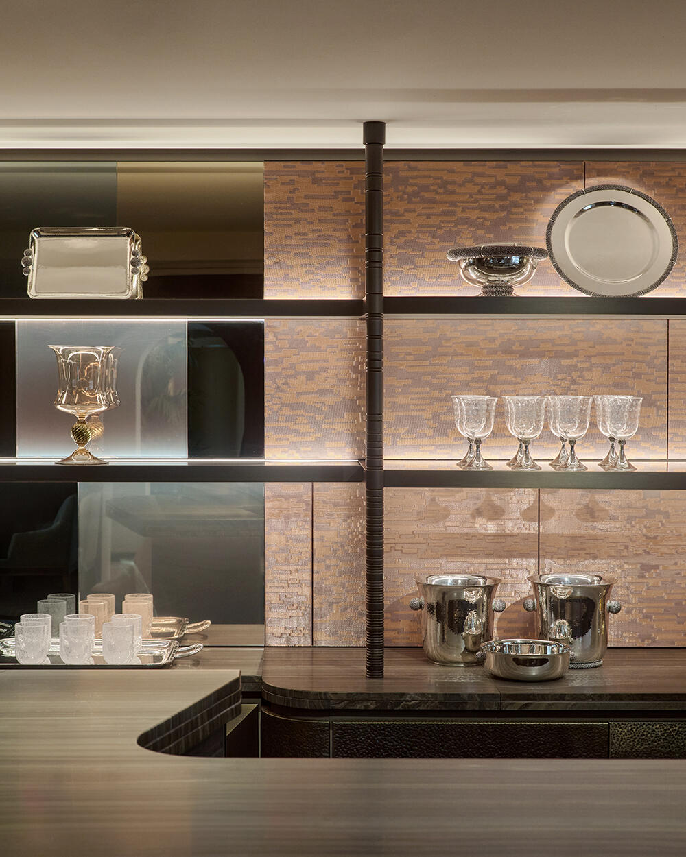 Silverware display with mosaic tile backsplash